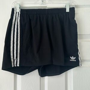 ADIDAS shorts fits size medium best also fits high waisted if wanted